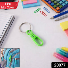 Vibrant mini plastic carabiner keychain with metal ring holding keys.