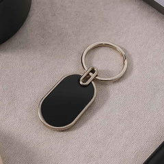Oval Metal Keychain – Elegant Black & Silver Finish for Everyday Use