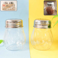 Close-up of stainless steel lid with spout on spice shaker from oregano chilli flakes dispenser set