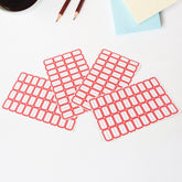 Stack of red border label stickers for versatile home and office organization.