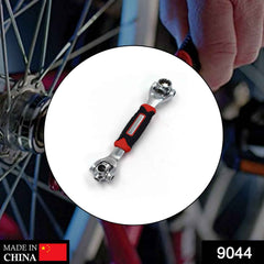 Ergonomic RaceVault multi-tool wrench demonstrating its 360-degree rotation feature.