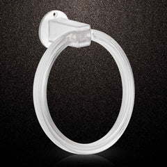 Clear ABS towel ring installed on a bathroom wall, holding a neatly folded white hand towel.