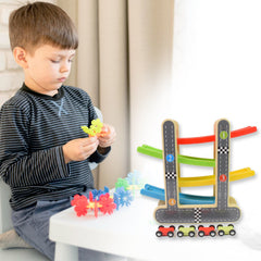 Close-up of the durable wooden ramp racer track with mini cars in action.