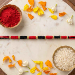 Handmade Rakhi Ð Traditional Beaded Thread with Golden Accents