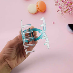 Matte look hair clamp clip showing durable plastic material