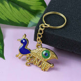 Krishna Peacock Keychain – Spiritual Golden Metal Charm