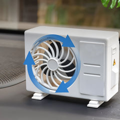 Solar-powered car air freshener clipped onto car AC vent for fragrance