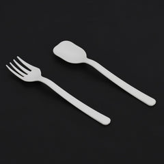 A pack of Quickslice disposable plastic forks and spoons, ideal for party supplies.