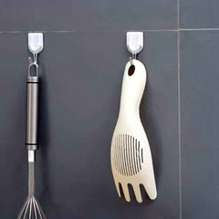 Durable PP plastic rice strainer with handle, shown washing grains.