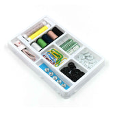 62-piece sewing kit with thread spools and essential tools displayed.