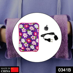 Electric Hot Water Bag shown with its charging cable, highlighting its rechargeable feature.
