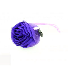 Compact rose-shaped pouch, demonstrating how the reusable shopping bag folds for portability.