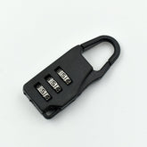 A sleek black 3-digit luggage lock securely attached to a suitcase zipper.