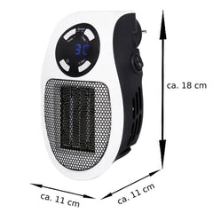 Energy-saving desktop heater plugged directly into a wall socket with its 360-degree rotating plug.