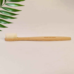 Ergonomic wooden handle of MintGuard bamboo toothbrush for comfortable grip