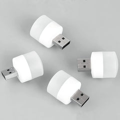 Portable USB bulb connected to a power bank, ready for emergency light situations.