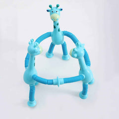 Multiple LED giraffe fidget toys stretched and twisted into various shapes.