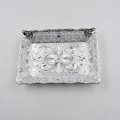 Decorative mukhwas serving tray beautifully arranged on a modern dining table.