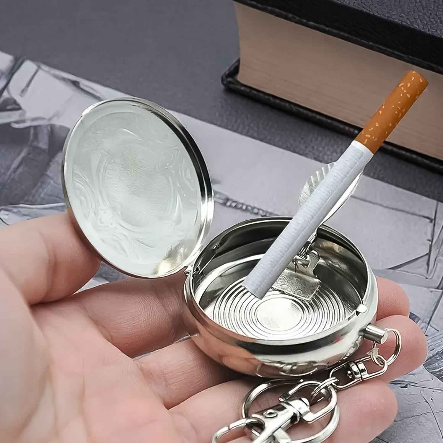 Steel pocket ashtray keyring with secure lid