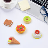 Set of five colourful 3D Fast Food Erasers, including a burger, fries, and soft drink.