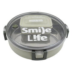 An adult holding the sleek Miracle Stainless Steel Lunch Box, ideal for office or school lunches.