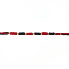 Red and black thread Rakhi with detailed craftsmanship