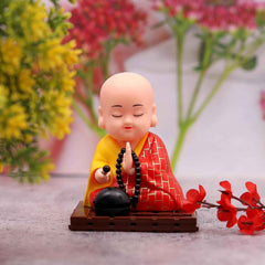 Solar Buddha Statue – Moving Head & Hand Decor | XcelCraft
