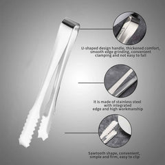 Set of two stainless steel serving tongs on a clear glass plate.