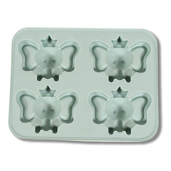 Ice cubes in fun cartoon shapes being easily released from the silicone tray.