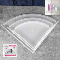 Three-piece white plastic corner shelf set displayed in a modern bathroom.