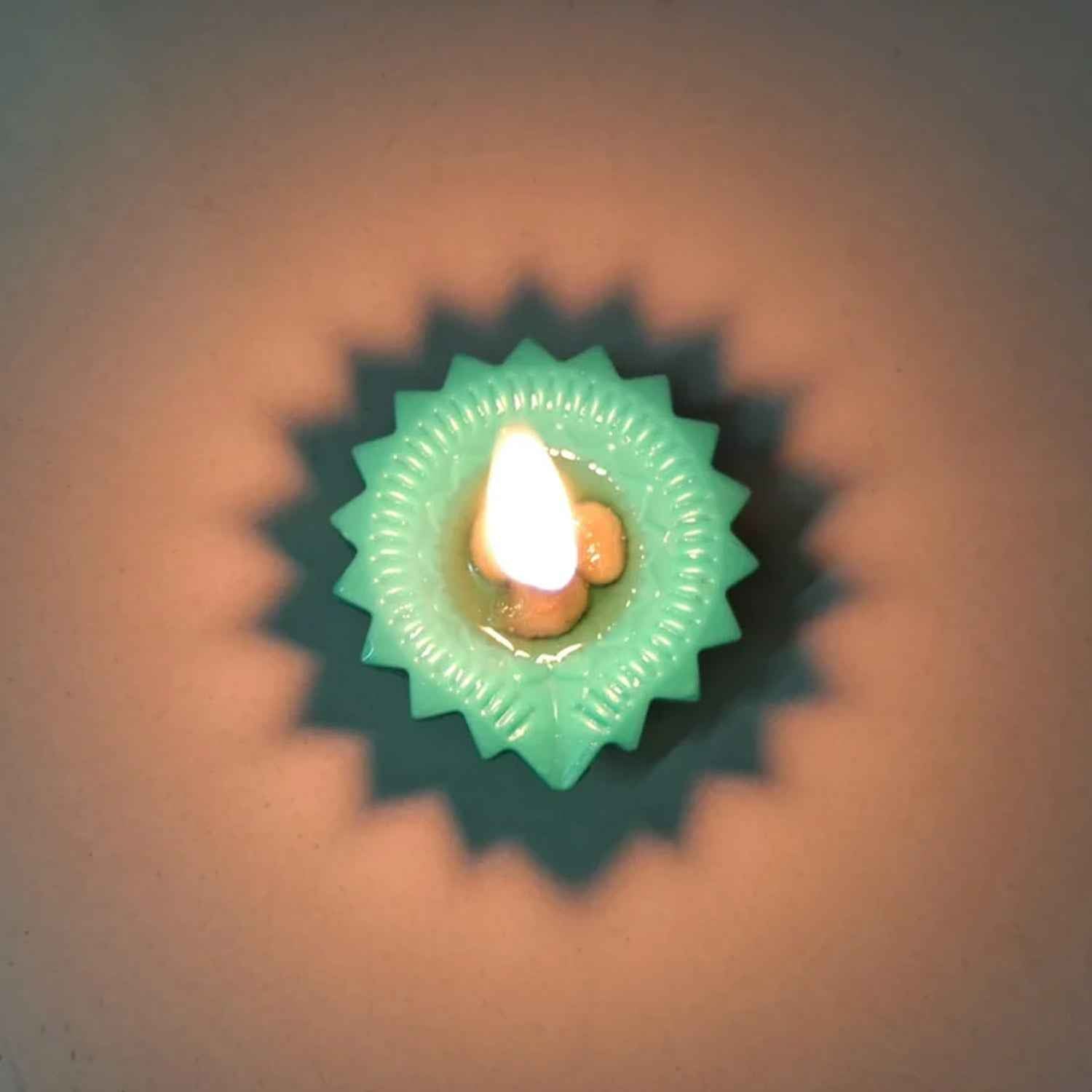 A colourful silicone diya glowing brightly for Diwali celebrations, enhancing festive decor.