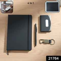 Executive travel essentials gift set with notebook, pen, card holder, and keychain