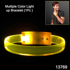Close-up of a GlowRun multicolor LED safety band worn by a runner at night.