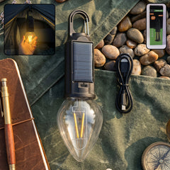Carabiner clip attached to solar camping lantern for hanging