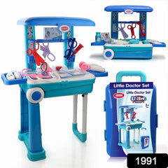 Child playing with the medical toy trolley, checking a patient's heartbeat.