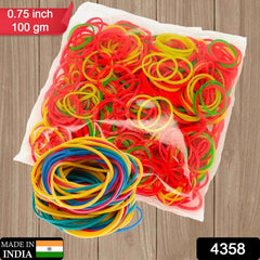 Elastic rubber bands organizing office documents and stationery supplies.