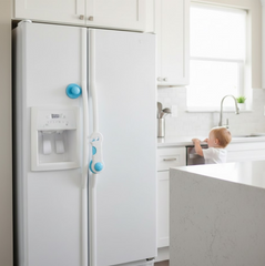 Child safety lock seamlessly installed on a kitchen cabinet door.