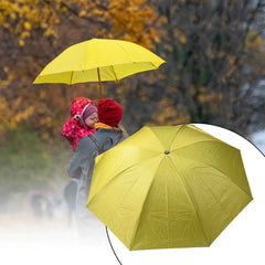 Open vegetable shaped folding umbrella providing sun and rain protection.