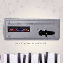 Close-up of the microphone input on the kids piano keyboard.