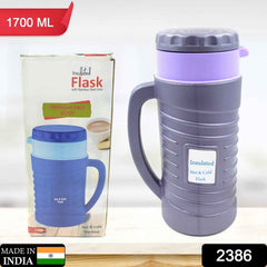 Ergonomic design of a Nekza insulated flask for easy pouring.