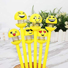 A set of vibrant emoji ballpoint pens, perfect for adding fun to schoolwork.