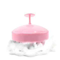 Hand holding the easy-grip scalp massager shampoo brush for comfortable use.