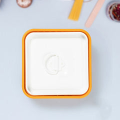 Demonstration of using the Paneer Maker to press excess water from cheese.