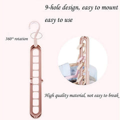 Versatile folding hanger with nine holes, demonstrating its compact storage capability.