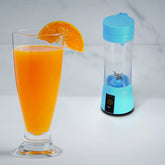 Portable juicer blender with 6 blades, ideal for making fresh fruit juice.