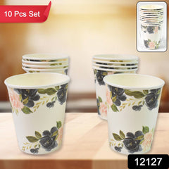 Stack of colorful disposable paper cups, ideal for hot and cold drinks.