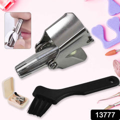 Close-up of the manual nose hair clipper, highlighting its precise cutting mechanism.