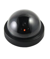 Realistic wireless dummy security camera with a visible lens for effective deterrence.