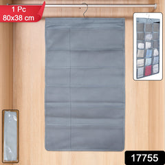 Open multi-pocket hanging under garment organizer inside a closet