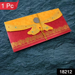 Close-up of a premium multicolour cash gift cover with intricate traditional Indian design.